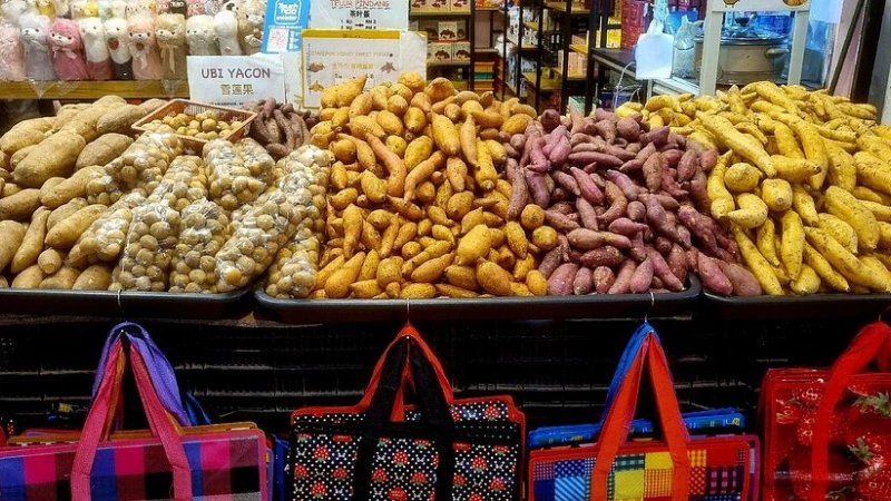 Fresh sweet potatoes and local produce at Kea Farm Market, a popular shopping stop you can visit easily with our Cameron Highlands day trip private car service.