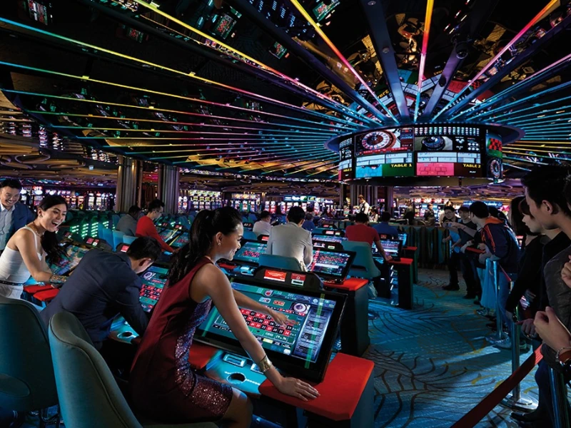 The futuristic electronic gaming zone at SkyCasino with stunning LED ceilings, a top-tier attraction you can enjoy 24/7 with a reliable Genting Highlands day trip private car.