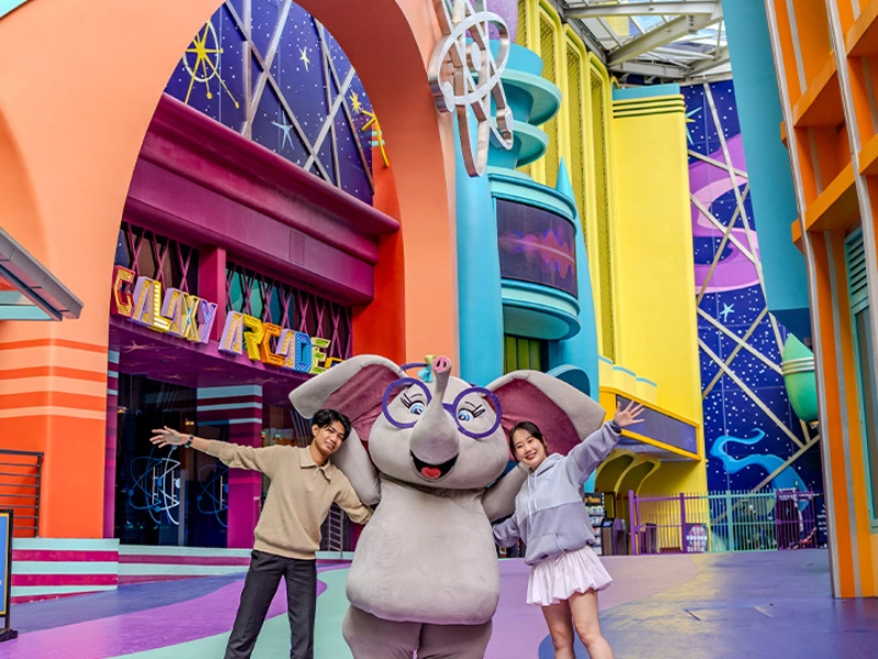 Friendly mascot encounter at Galaxy Arcade, Genting SkyWorlds, a fun family highlight included in your Genting Highlands day trip private car tour.