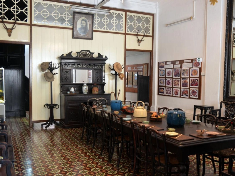 The vintage dining room inside Han Chin Pet Soo museum, a heritage site you can visit right on schedule with our stress-free private transfer on your Ipoh day trip.
