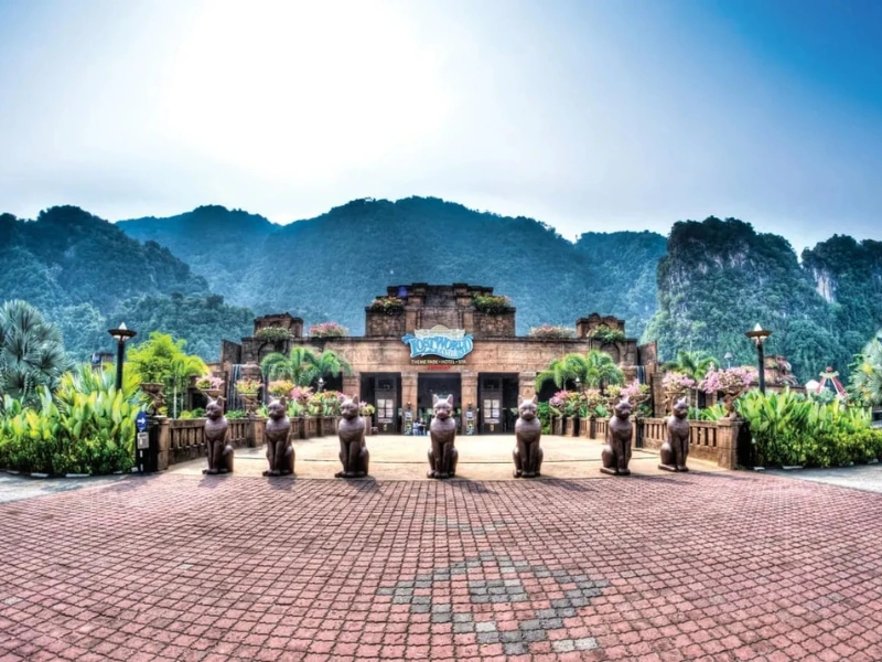 The majestic entrance of Sunway Lost World of Tambun framed by limestone hills, a premier theme park you can arrive at effortlessly with our private transfer on your Ipoh day trip.