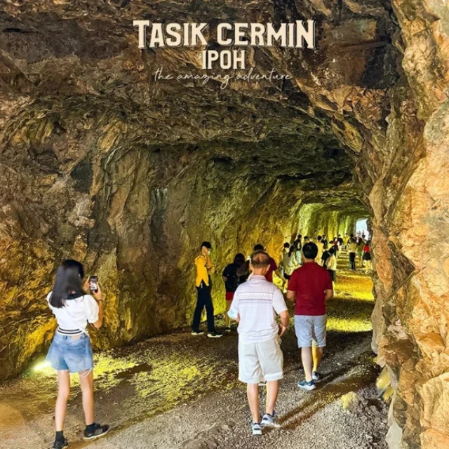 The unique limestone tunnel entrance leading to Tasik Cermin, an exciting hidden adventure you can experience without rushing during your Ipoh day trip.