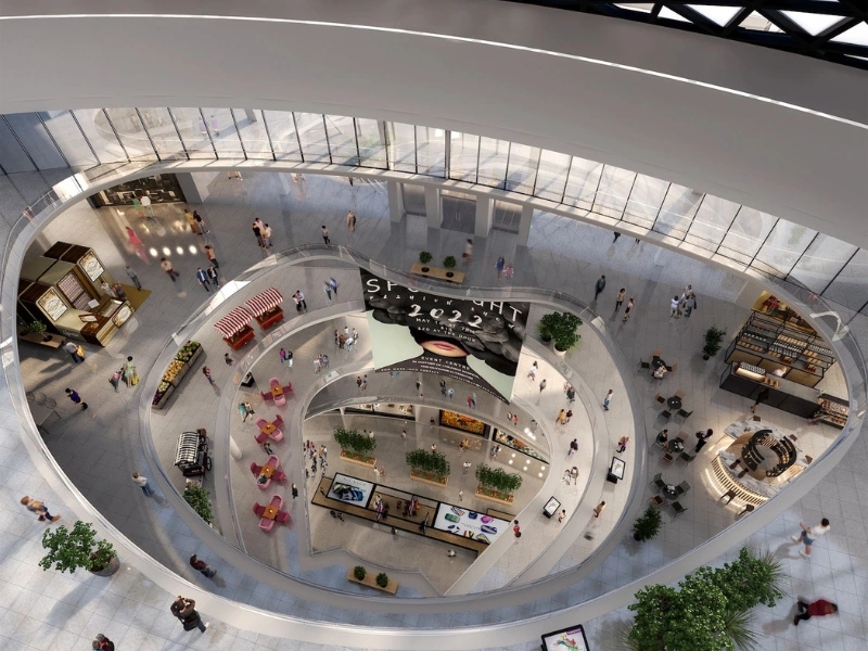 A top-down view of the spectacular circular retail levels under the glass dome at 118 Mall, a premium lifestyle stop to add to your Kuala Lumpur day trip private car itinerary.