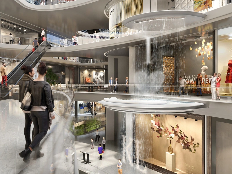 The stunning multi-level waterfall and modern interior of the upcoming 118 Mall, a luxurious shopping destination perfectly suited for your Kuala Lumpur day trip private car tour.