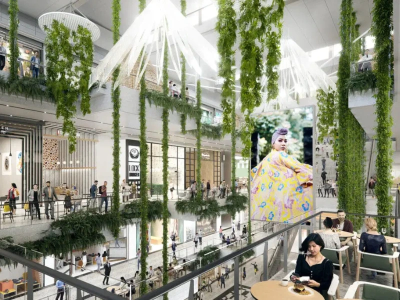 Lush hanging greenery and modern dining spaces inside The Exchange TRX mall, a premium eco-lifestyle destination perfect for your Kuala Lumpur day trip private car itinerary.