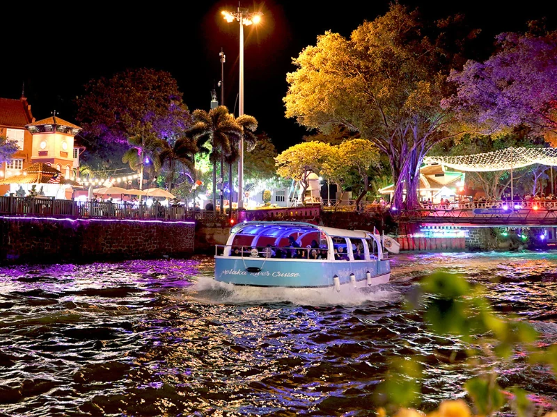 Scenic Melaka River Cruise exploring the historic UNESCO city, a relaxing activity to enjoy during your Malacca day trip private car tour.