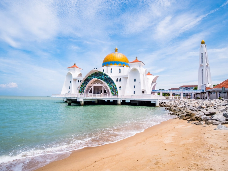 The beautiful floating Malacca Strait Mosque, a breathtaking scenic stop easily reached during your Malacca day trip private car tour.