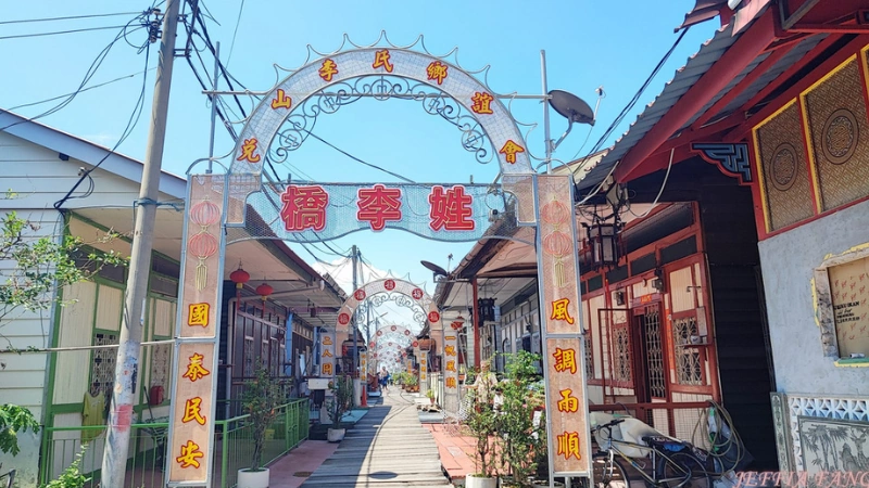The serene and authentic wooden stilt houses at Lee Jetty in Georgetown, a quiet heritage site you can comfortably explore without parking hassle on your Penang Day Trip private car.