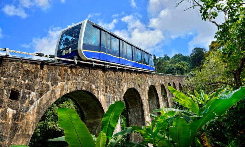 The historic Penang Hill funicular railway climbing to the peak, an iconic attraction you can reach effortlessly without parking stress using our Penang Day Trip private car.