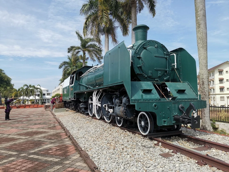Vintage O Class steam locomotive displayed at the Army Museum, a unique historical photo spot to enjoy during your Port Dickson day trip private car tour.