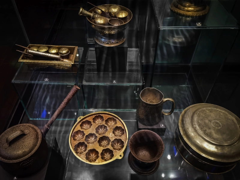 Traditional cultural artifacts and historical exhibits inside Muzium Lukut, an insightful educational stop during your Port Dickson day trip private car tour.
