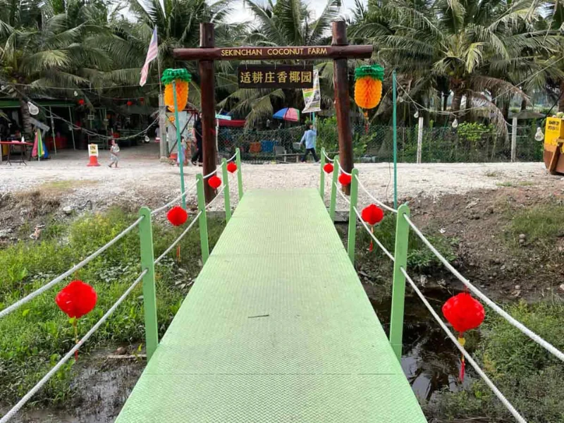 The entrance to the weekend-only Sekinchan Coconut Farm, a refreshing stop for coconut shakes easily added to your flexible Sekinchan day trip private car schedule.