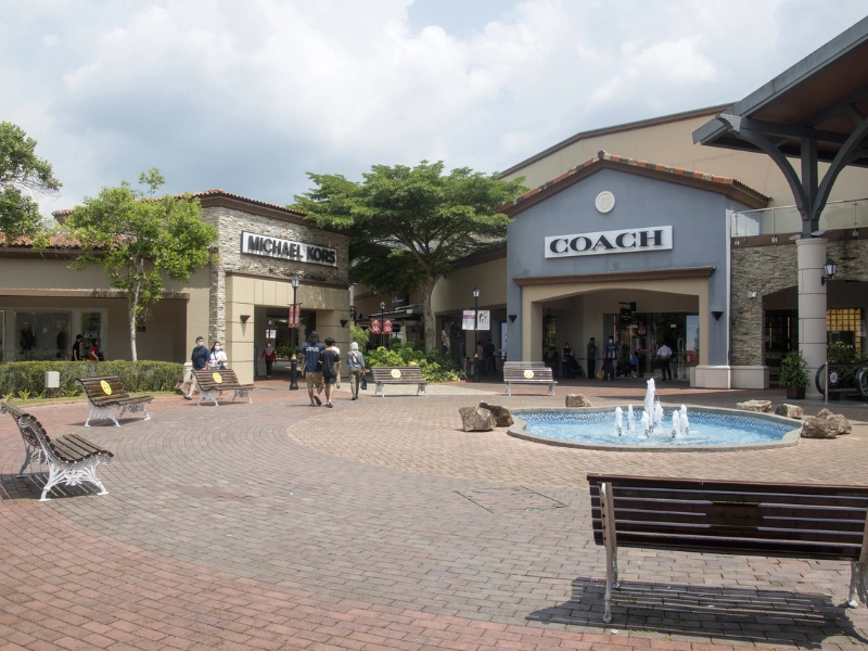 Shoppers exploring premium brands at JPO during a hassle-free Singapore to JB day trip with door-to-door service.