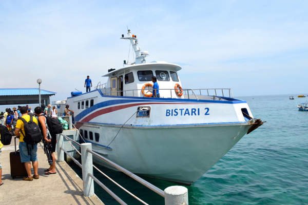 Passengers boarding a ferry to Tioman Island, seamlessly connecting with our door-to-door Singapore to Mersing day trip transfer.