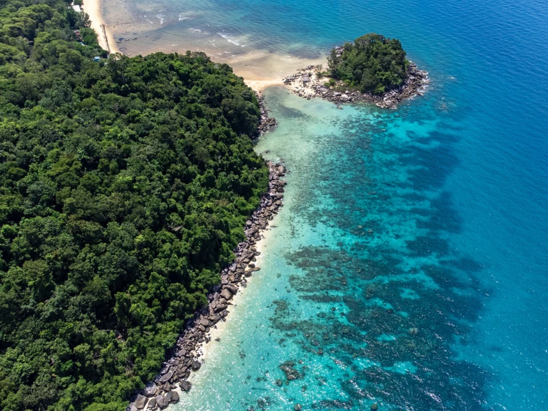 Beautiful Tioman Island snorkeling paradise reached via our Singapore to Mersing day trip private car.
